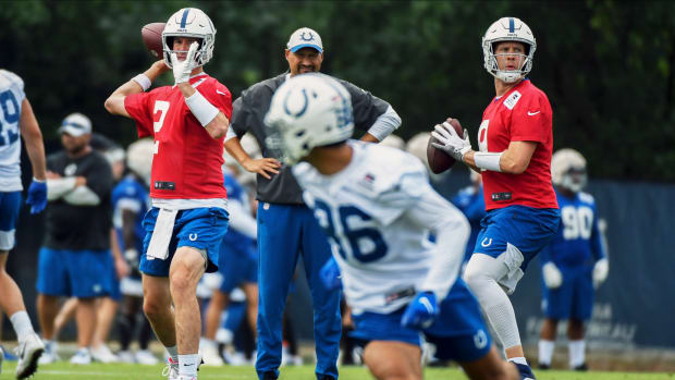 Jun 7, 2022; Indianapolis, Indiana, USA; Indianapolis Colts quarterback Matt Ryan (2) and Indianapolis Colts quarterback Nick Foles (9) throw passes during minicamp at the Colts practice facility. Mandatory Credit: Robert Goddin-USA TODAY Sports